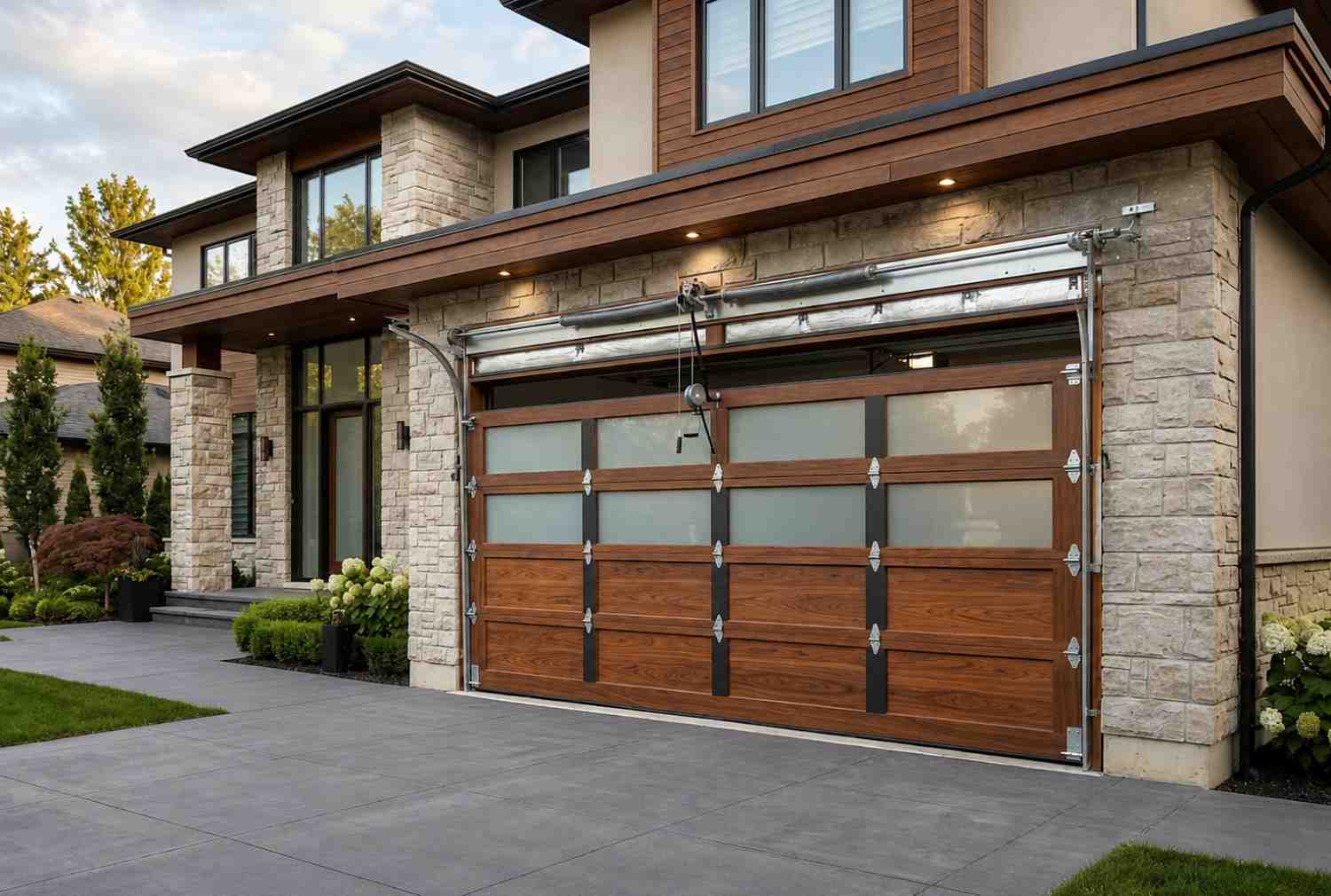 Professional garage door technicians installing and servicing a custom wood-and-glass garage door on a luxury home. Expert garage door repair, maintenance, and installation services showcased with modern residential architecture, premium craftsmanship, and high-end home exterior improvements.