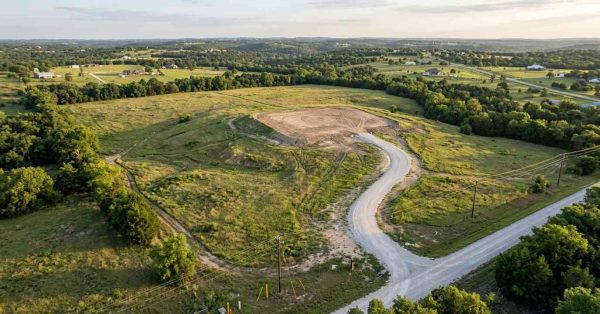 Vacant land parcel with graded building site and newly constructed access road