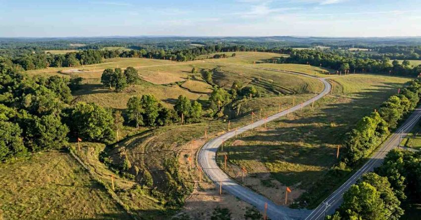 Large undeveloped land tract with road access and marked future development lots